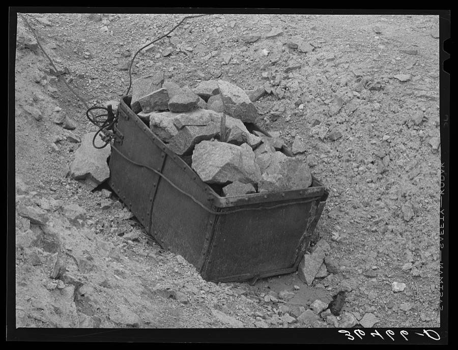 Old ore bucket and gold ore at abandoned gold mine at Pinos Altos, New Mexico
