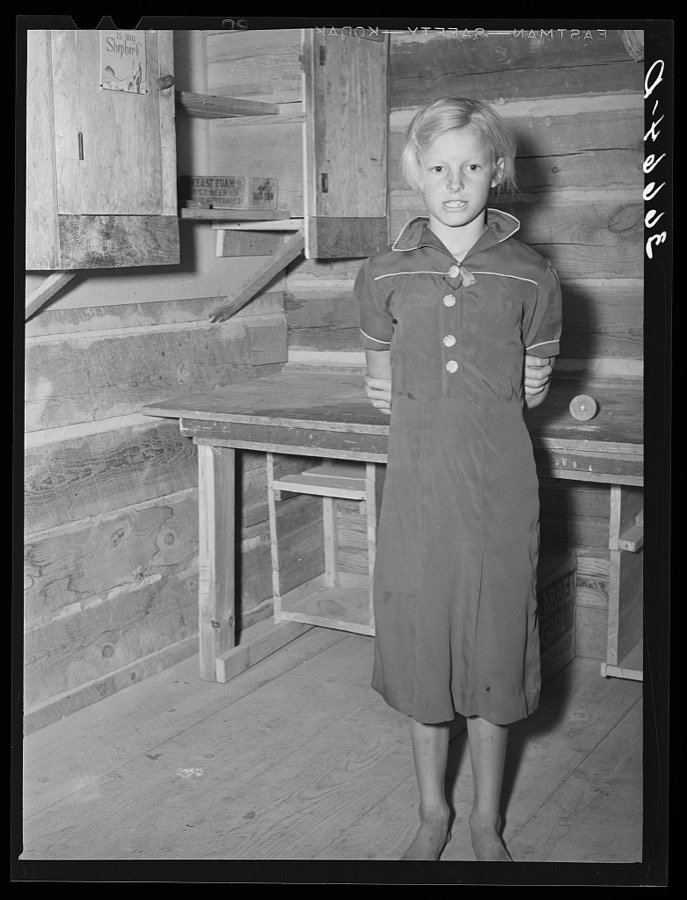 Homesteader's daughter giving a recitation at the literary society. Pie Town, New Mexico