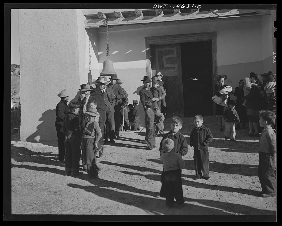 Trampas, New Mexico. Congregation leaving after mass from a church which was built in 1700 and is the best-preserved colonial mission in the Southwest