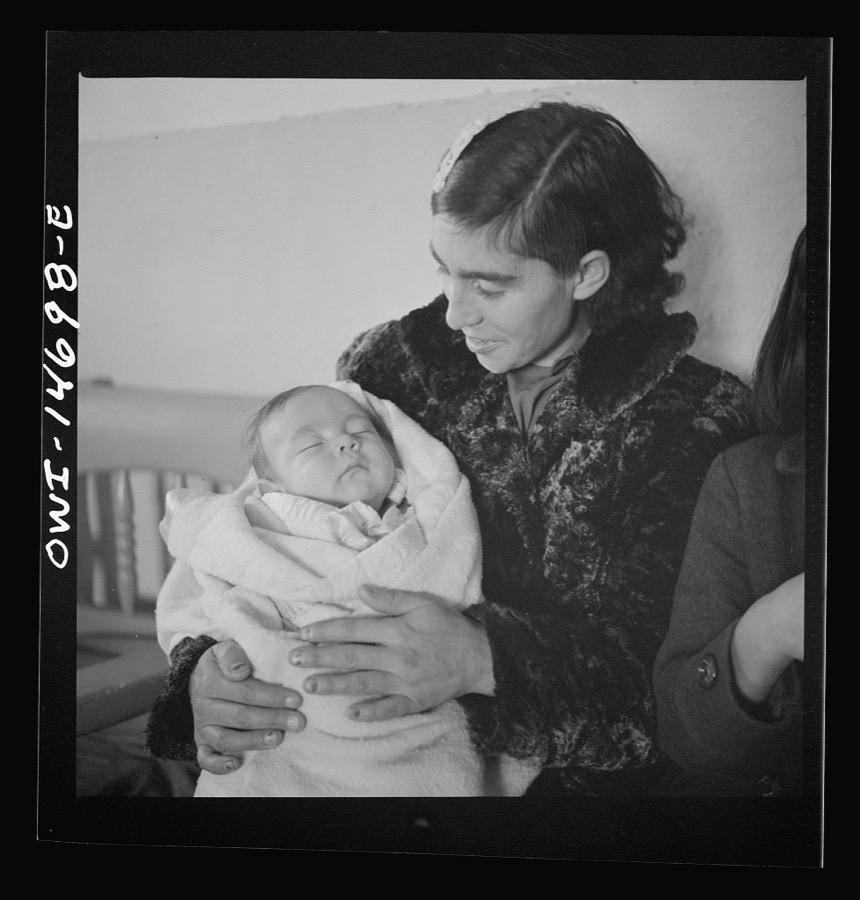 Penasco, New Mexico. Waiting room of the clinic operated by the Taos County cooperative health association on well baby day
