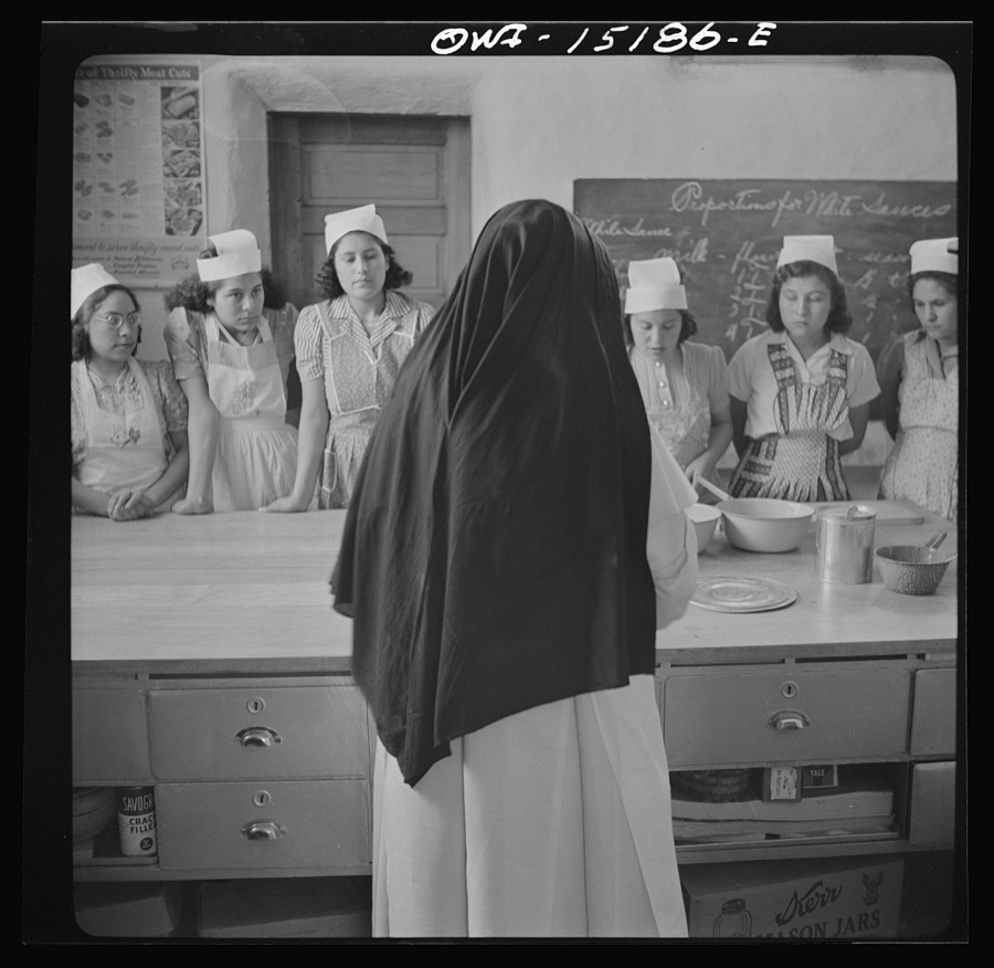 Penasco, Taos County, New Mexico. Domestic science class in a high school which is supported by the state but administered by the Roman Catholic Church