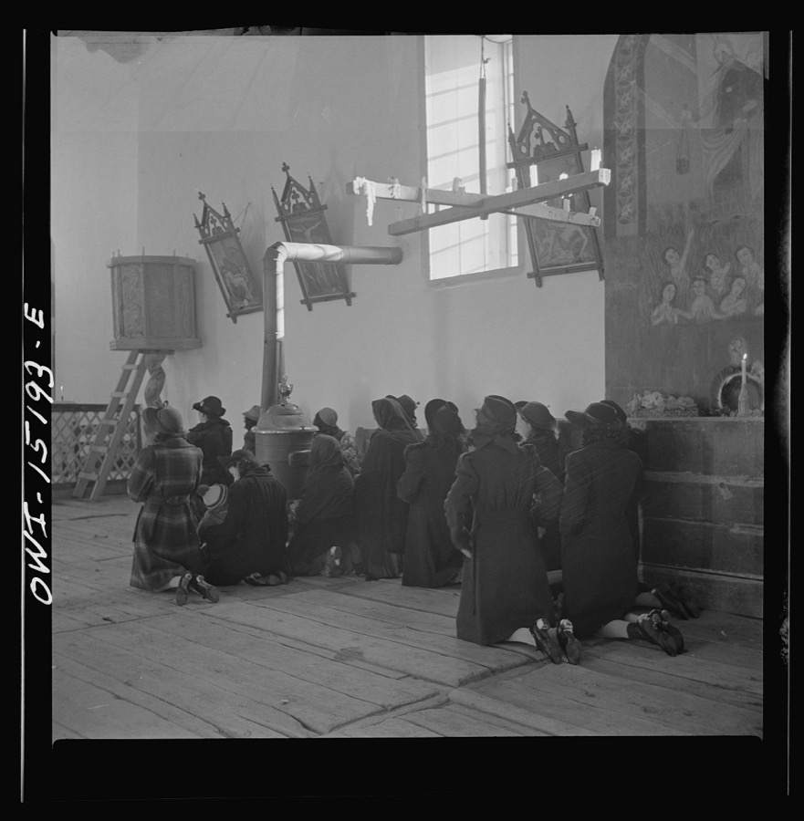 Trampas, New Mexico. Father Cassidy conducting mass at a church which was built in 1700 and is the best-preserved colonial mission in the Southwest