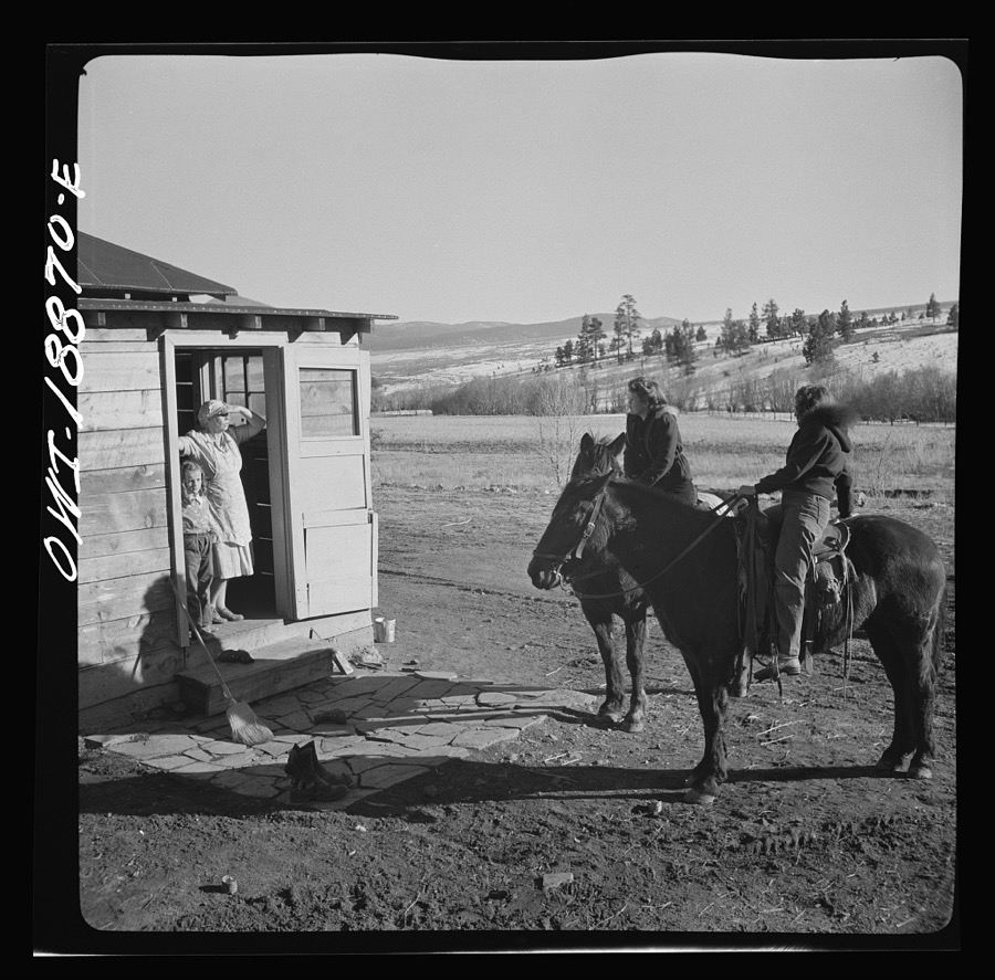 Moreno Valley, Colfax County, New Mexico. George Mutz's daughters calling on a nearby ranch