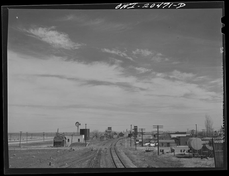 Fort Sumner (vicinity), New Mexico. Passing through a small town on the Atchison, Topeka and Santa Fe Railroad in the Pecos River Valley enroute to Vaughn, New Mexico