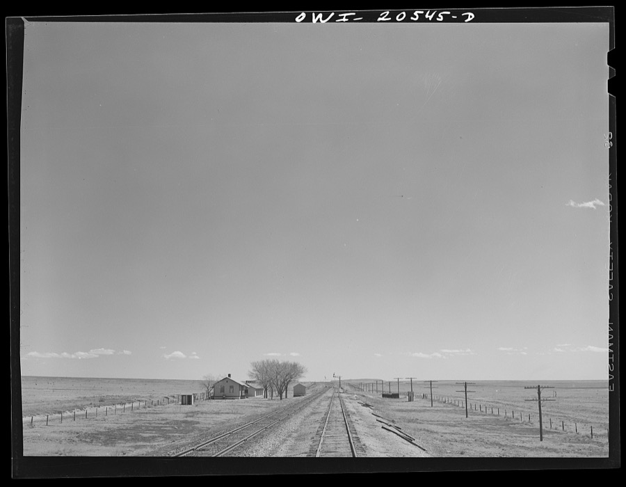 Encino (vicinity), New Mexico. Passing a section house along the Atchison, Topeka, and Santa Fe Railroad