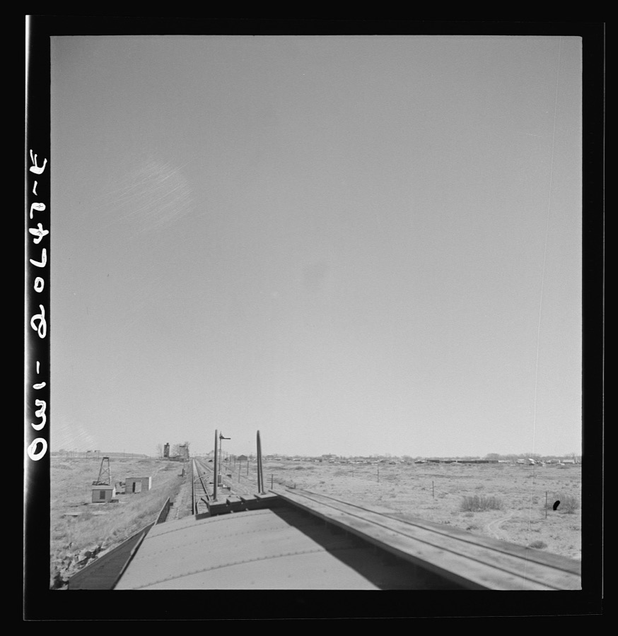 Fort Sumner, New Mexico. Train about to cross Pecos River along the Atchison, Topeka, and Santa Fe Railroad between Clovis and Vaughn, New Mexico