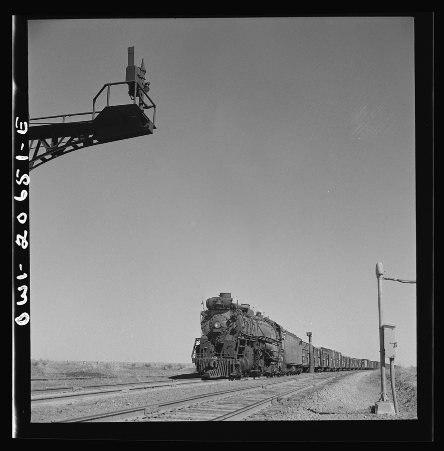 Fort Sumner, New Mexico. Going across the sheep and cattle country along the Atchison, Topeka, and Santa Fe Railroad, between Clovis and Vaughn, New Mexico