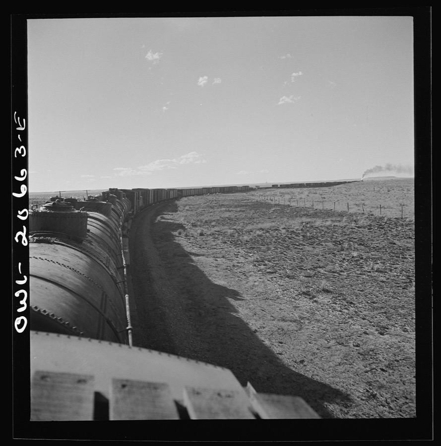 Buchanan, New Mexico. Rounding a long curve approaching the town along the Atchison, Topeka, and Santa Fe Railroad between Clovis and Vaughn, New Mexico