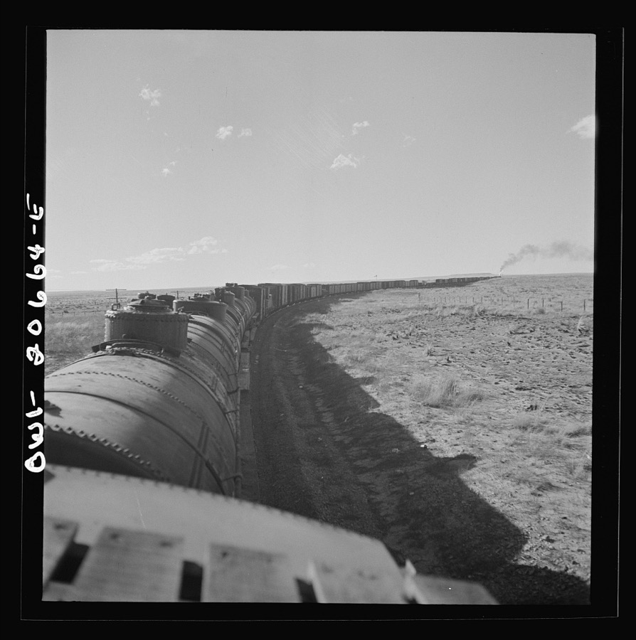 Buchanan, New Mexico. Rounding a long curve approaching the town along the Atchison, Topeka, and Santa Fe Railroad between Clovis and Vaughn, New Mexico