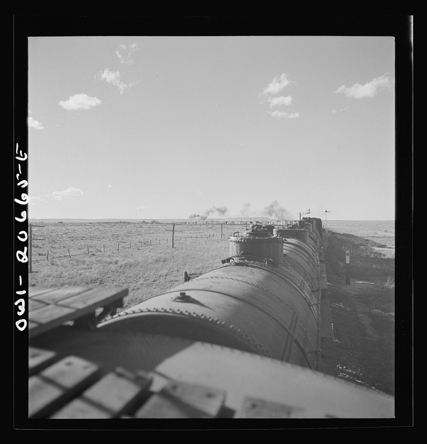 Buchanan, New Mexico. Passing an eastbound freight along the Atchison, Topeka, and Santa Fe Railroad between Clovis and Vaughn, New Mexico