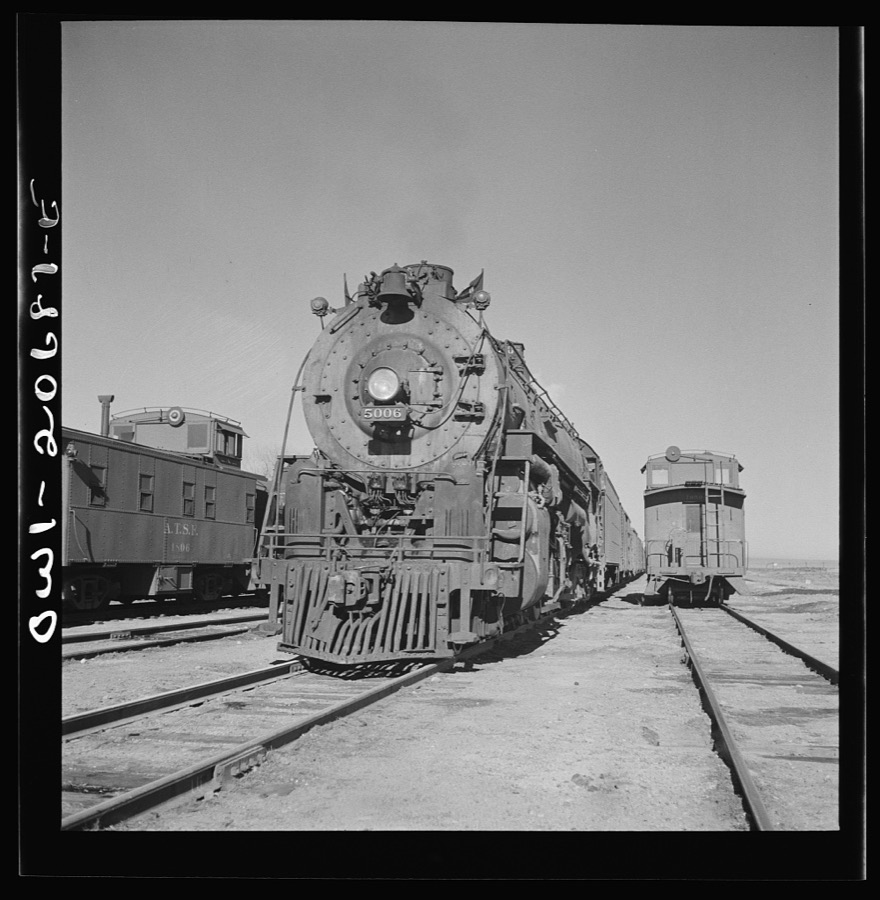 Vaughn, New Mexico. Easternbound train about to leave the Atchison, Topeka and Santa Fe Railroad yard on the return trip