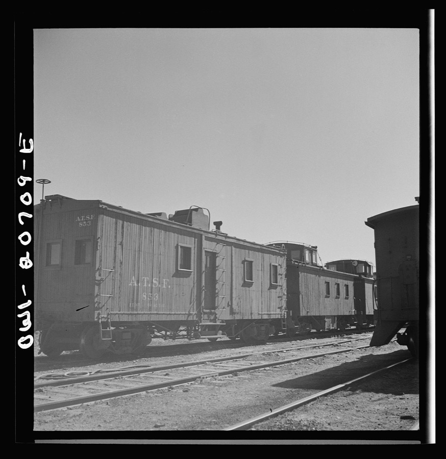 Vaughn, New Mexico. A caboose on the Atchison, Topeka and Santa Fe Railroad yard converted from an old box car