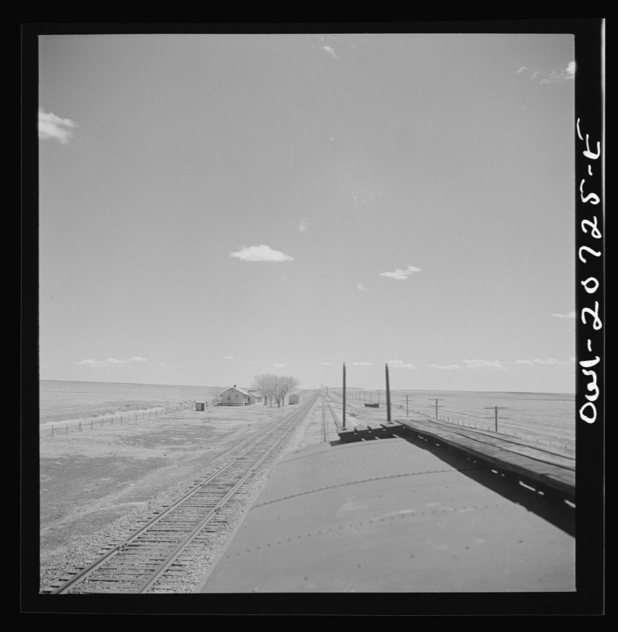 Encino, New Mexico. Passing a section house along the Atchison, Topeka and Santa Fe Railroad between Vaughn and Belen, New Mexico