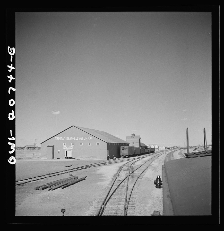 Mountainair, New Mexico. Going through the town on the Atchison, Topeka and Santa Fe Railroad between Vaughn and Belen, New Mexico. The surrounding area raises great quantities of red beans