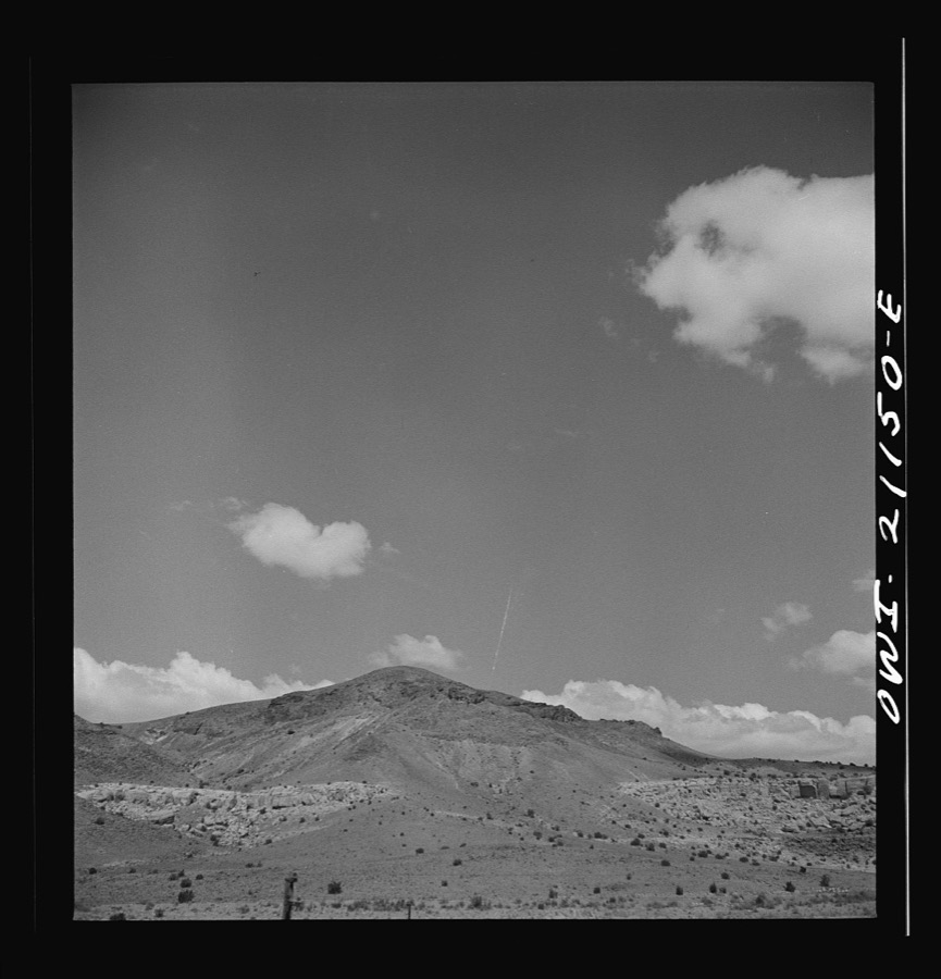 Laguna (vicinity), New Mexico. Hills studded with dwarf cedars along the Atchison, Topeka and Santa Fe Railroad between Belen and Gallup, New Mexico