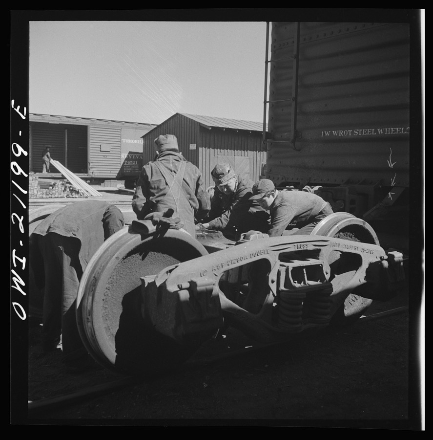 Gallup, New Mexico. Laguna Indians working in the Atchison, Topeka and Santa Fe Railroad shops. There are about twenty of them employed in various capacities at the car shops