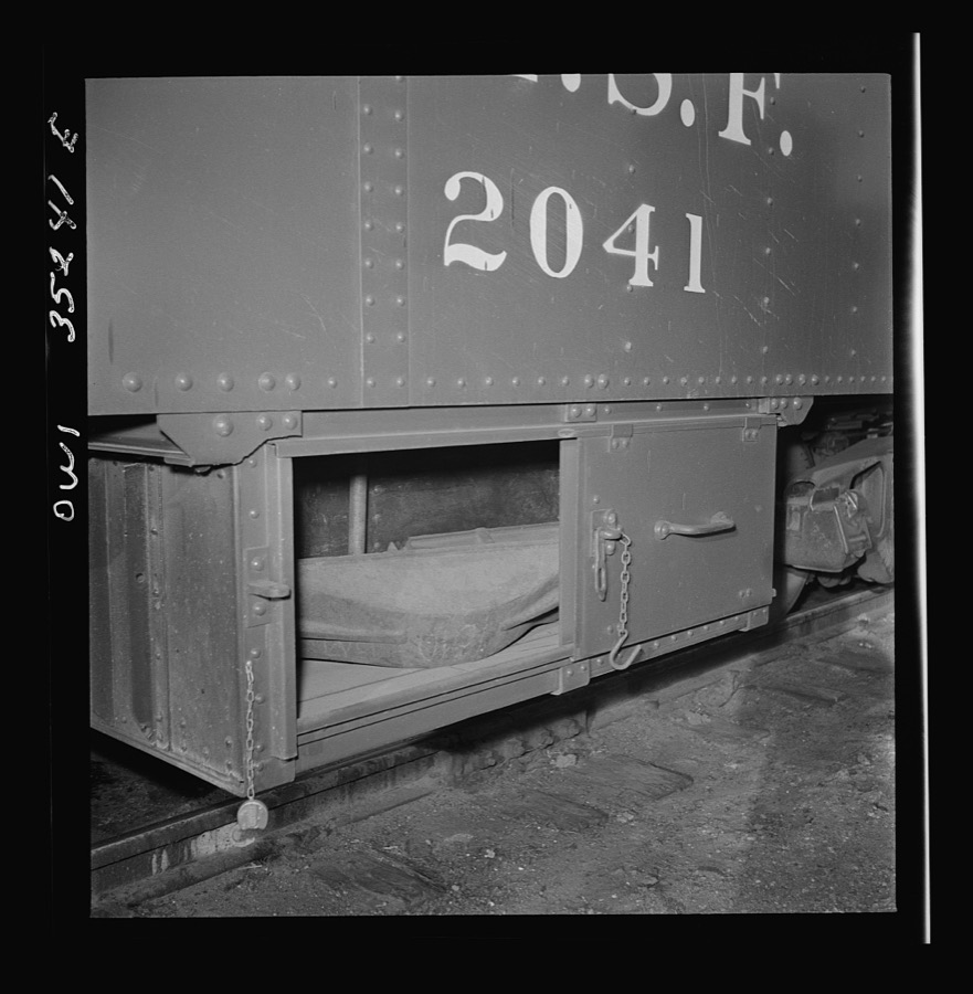 Clovis, New Mexico. Compartment in a new Atchison, Topeka and Santa Fe Railroad caboose containing a "frog" for rerailing a car