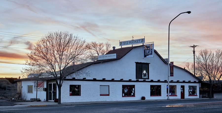 The 1912 produce and meat market at dusk in the small New Mexico city of Grants, along old U.S. Route 66 between Albuquerque and Gallup