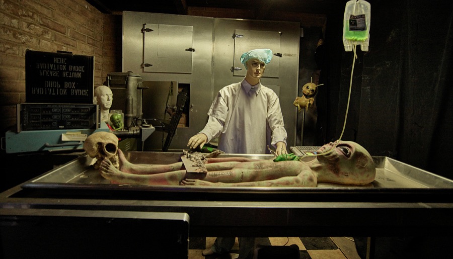 Space alien figures (and those who examine them) get their own room inside Fox Cave in Ruidoso, New Mexico