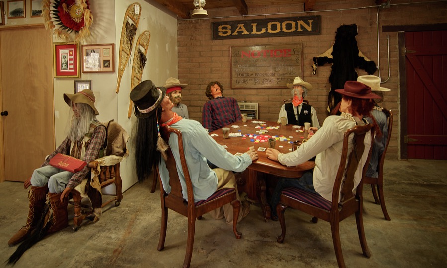 A Wild West poker game imagined at Fox Cave (once said to be a hideout for the famous outlaw "Billy the Kid" Bonney) in Ruidoso, New Mexico