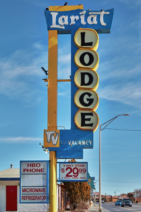 The refurbished street-side sign for the 1954-vintage Lariat Lodge (a lariat is a rope lasso) on historic U.S. Route 66 in Gallup, a small city near the Arizona border in far-western New Mexico