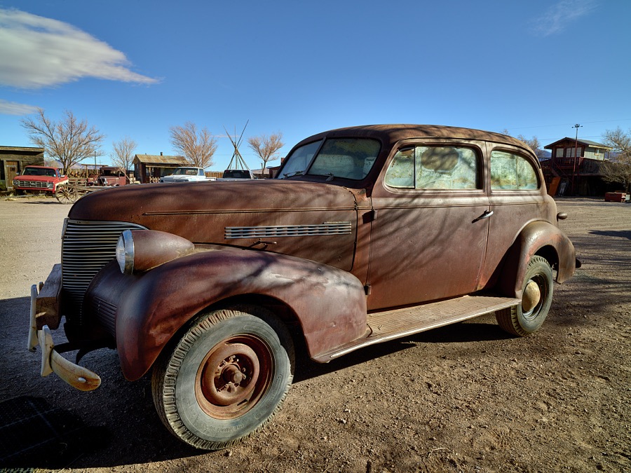 Vintage car at an installation that some call "outsider art" in the small, south-central New Mexico town of Carrizozo, with a population of 1,000 or so (as of 2021)
