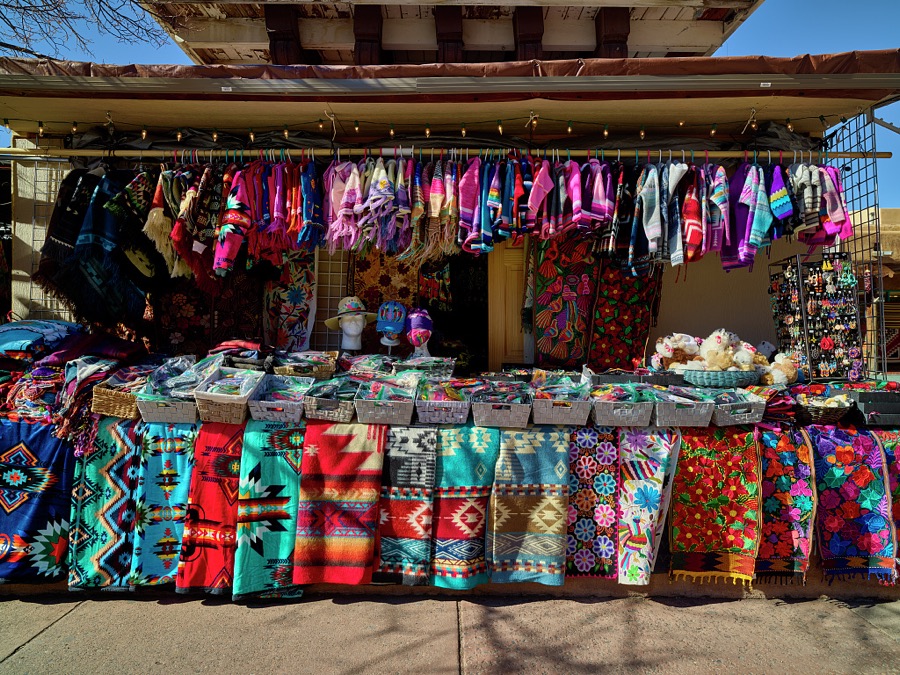 An array of colorful rugs and clothing items outside the Crazy Horse gift shop in Santa Fe, the capital city of the southwest U.S. state of New Mexico