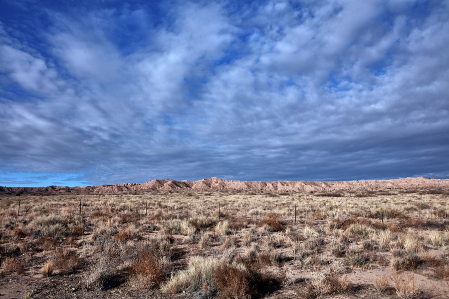 Scrubby high desert gives way to low, rocky ridges near Belen in central New Mexico