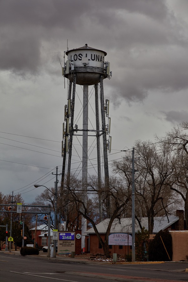 This water tower in the village of Los Lunas, the seat of Valencia County, New Mexico, south of Albuquerque, is old, but not too old be considered too fine a site for an array of cellphone transmitters
