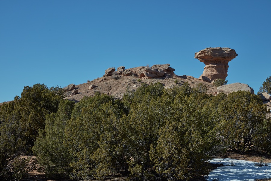 A pink-limestone formation near Tesuque Pueblo, New Mexico, near Santa Fe, that enough people believe looks like a resting camel that the formation is known as Camel Rock