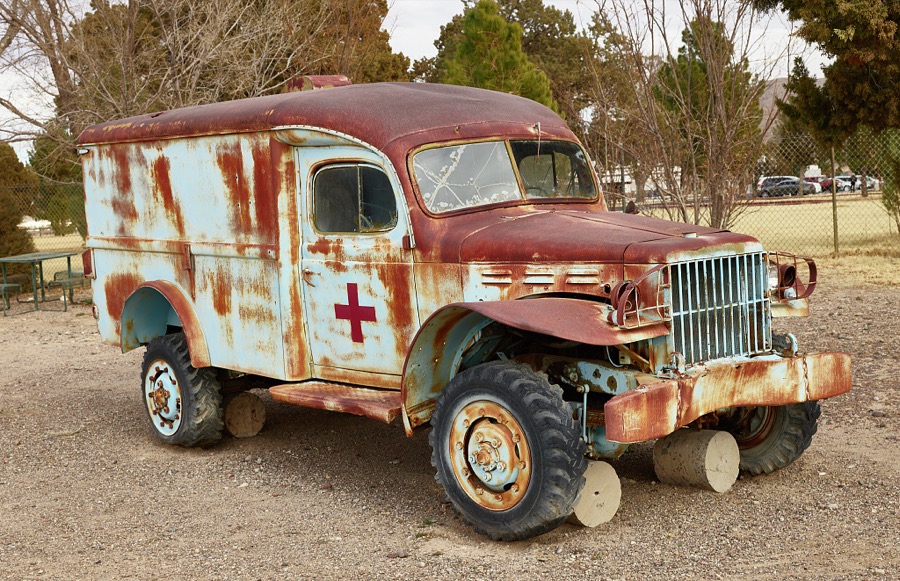 A vintage, but rusted and busted-up, military ambulance at Veterans Memorial Park in Truth or Consequences, New Mexico