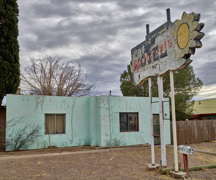 An old motel sign, mostly obliterated like some of the closed establishments, in Truth or Consequences, New Mexico