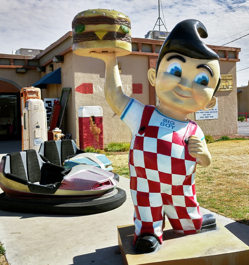 Old gas pumps, amusement-ride bumper cars, and the Big Boy restaurant advertising symbol keep unlikely company at Sparky's Burgers & BBQ (barbecue), a must-see roadside attraction in tiny Hatch, New Mexico, north of Las Cruces, that offers not only green-chili cheeseburgers, espresso, and other coffee drinks but also what one might call vintage, sometimes giant and funky, memorabilia assembled over 20 years by Sparky's owners, Josie Nunn and her husband, Teako