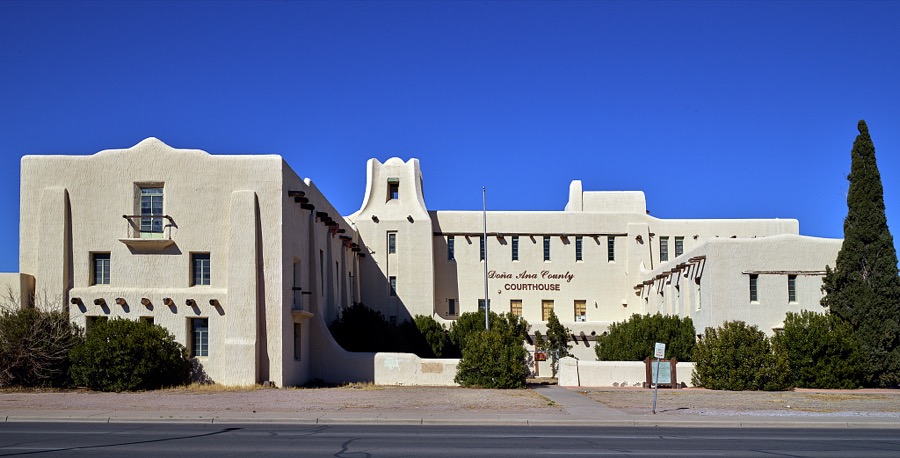The landmark white-adobe Dona Ana County Courthouse in Las Cruces, the hub city of southern New Mexico, 27 miles from the border with far-western Texas