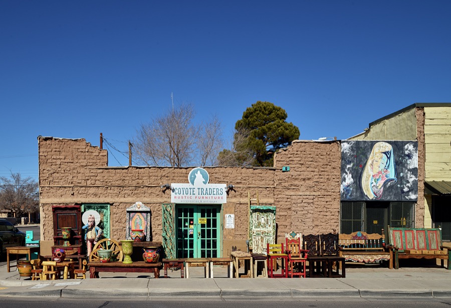 Unusual goods for sale line the street outside the Coyote Traders antique-and-collectibles store on Picacho Avenue, the old route into town on the west side of Las Cruces, the hub city of southern New Mexico, 27 miles from the border with far-western Texas