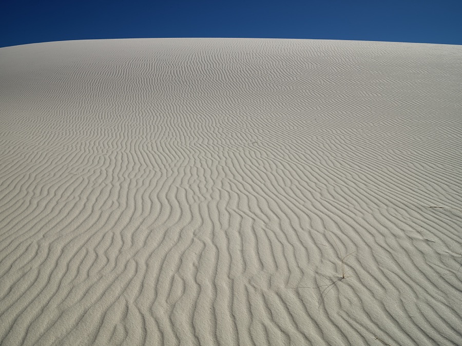 The site's trademark rippling waves accent the experience at White Sands National Park in southern New Mexico's Tularosa Basin