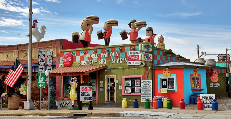 A parade of burger boys and girls dominates the skyline at Sparky's Burgers & BBQ (barbecue), a must-see roadside attraction in tiny Hatch, New Mexico, north of Las Cruces, that offers not only green-chili cheeseburgers, espresso, and other coffee drinks but also what one might call vintage, sometimes giant and funky, memorabilia assembled over 20 years by Sparky's owners, Josie Nunn and her husband, Teako