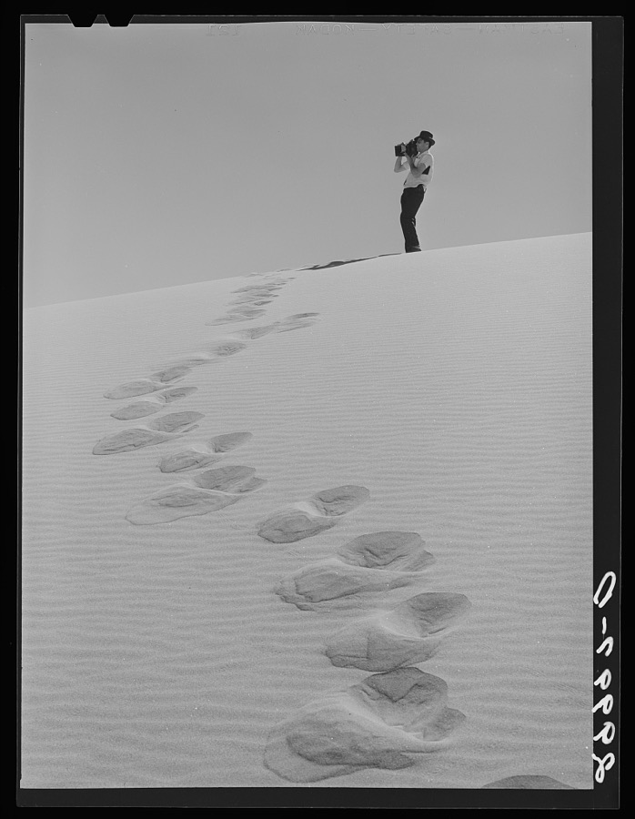 Sand dune. Nye County, Nevada Caption before agency editing: Photographing sand dune, Nye County, Nevada