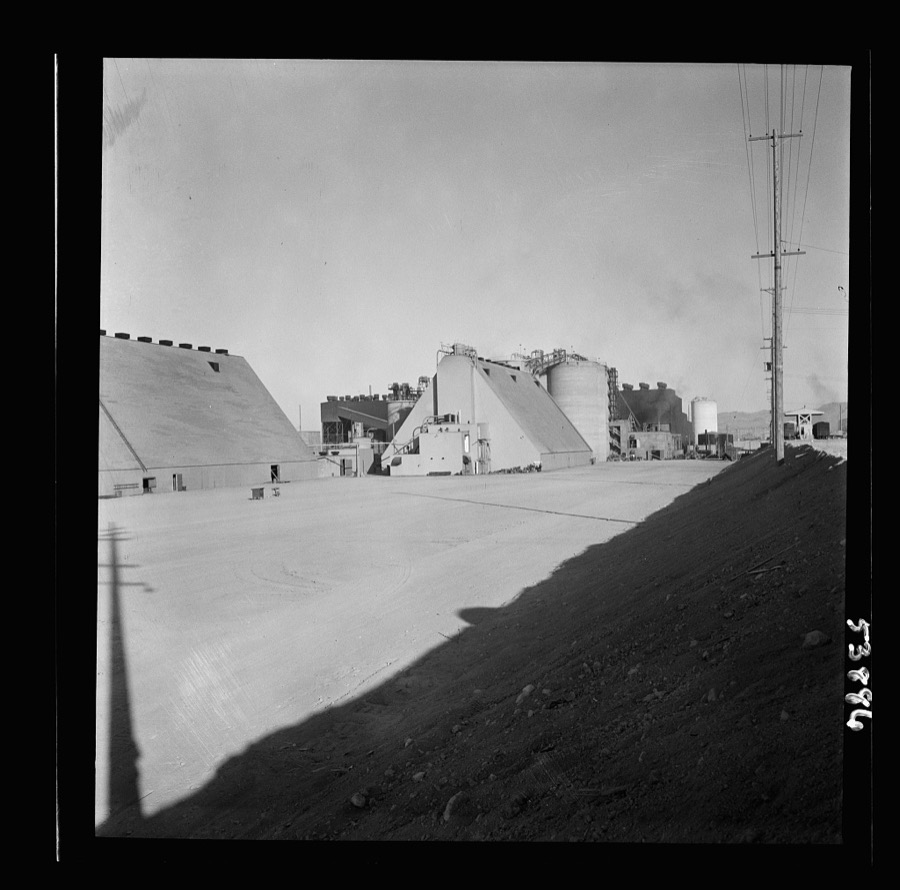 Las Vegas, Nevada. Peat storage buildings, silos for the storage of ore, and other structures of the Basic Magnesium Incorporated plant in the southern Nevada desert