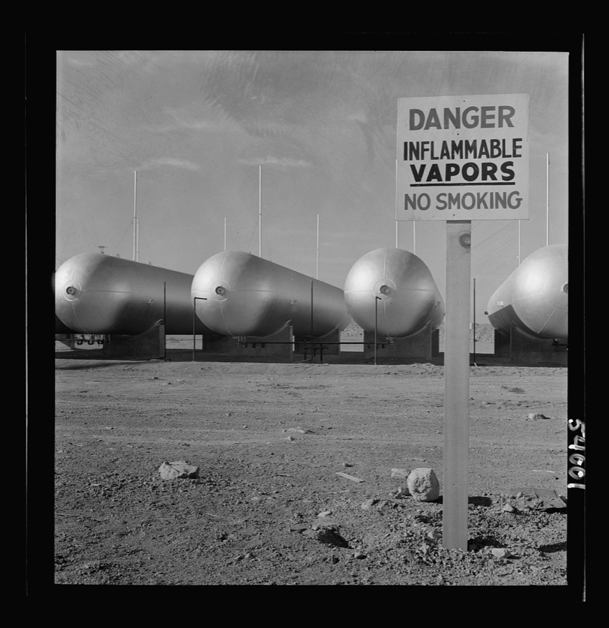Las Vegas, Nevada. Like a row of dirigible balloons, the propane gas storage tanks rest upon the floor of the southern Nevada desert at Basic Magnesium's giant plant, where magnesium is produced