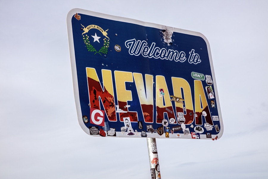 Roadside sign welcoming travelers to Nevada in the southeast corner of that western state at the Utah border, near Panaca