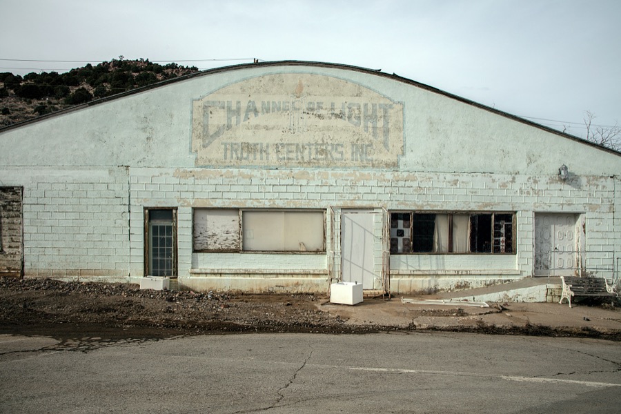 The old headquarters building of a Channel of Light Truth Center, a religious and educational center in the mining town of Pioche, which appears to hang along the side of a mountain and in a bowl below in Nevada's high desert, near the state's eastern border with Utah