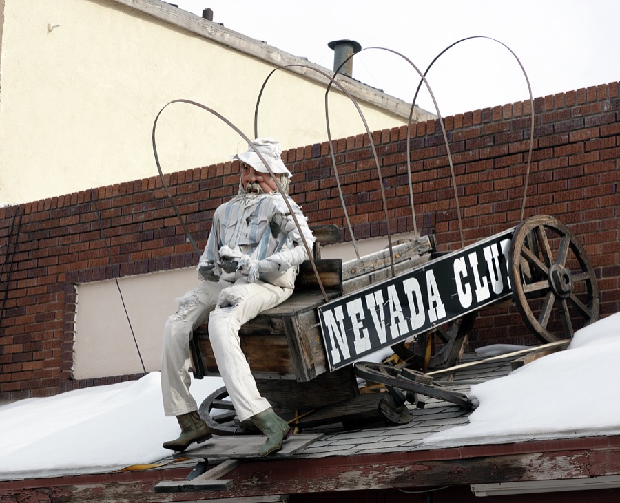 Entrance to the Nevada Club, a restaurant, small casino, and billiard parlor in the old mining town of Pioche, which appears to hang along the side of a mountain and in a bowl below in Nevada's high desert, near the state's eastern border with Utah