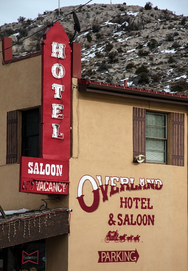 The Overland Hotel and Saloon in the old mining town of Pioche, which appears to hang along the side of a mountain and in a bowl below in Nevada's high desert, near the state's eastern border with Utah