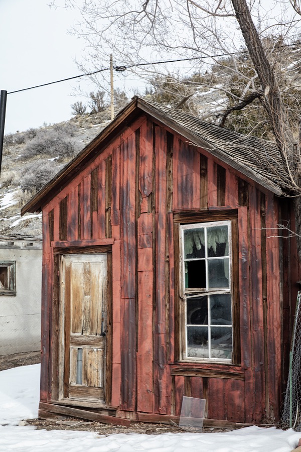 An old miner's cabin in the town of Pioche, which appears to hang along the side of a mountain and in a bowl below in Nevada's high desert, near the state's eastern border with Utah