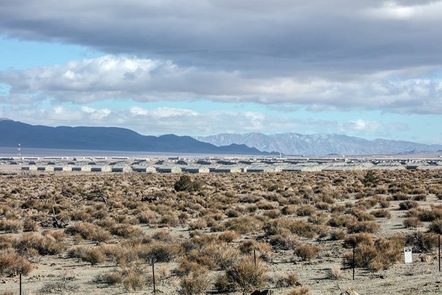 Near Walker Lake in the barren Nevada desert, drivers heading south to Las Vegas, Nevada (or the other way up to Reno) will pass a vast and mysterious cluster of military barracks and bunkers