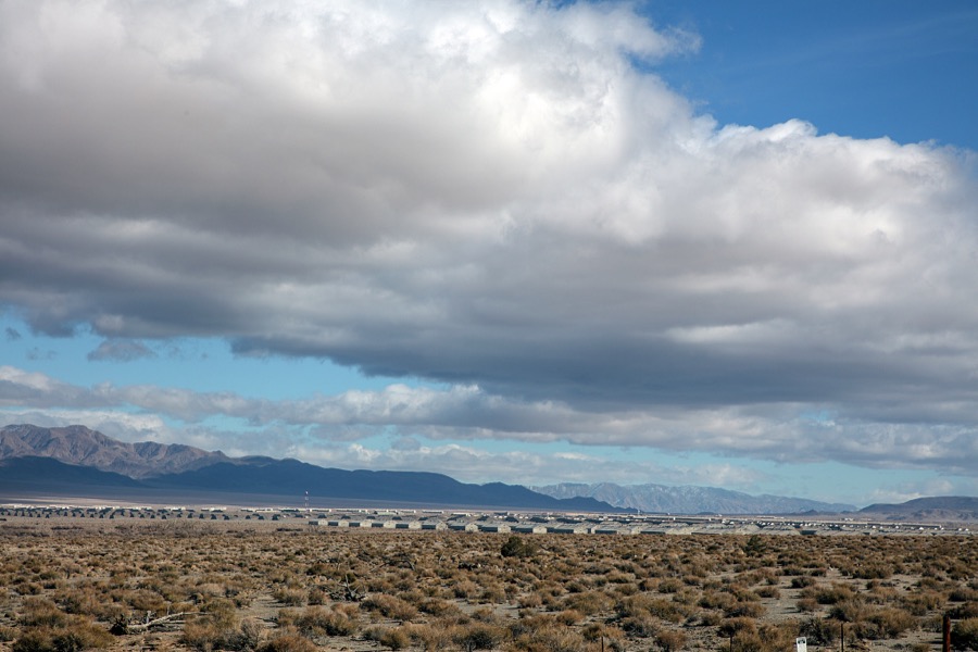 Near Walker Lake in the barren Nevada desert, drivers heading south to Las Vegas, Nevada (or the other way up to Reno) will pass a vast and mysterious cluster of military barracks and bunkers