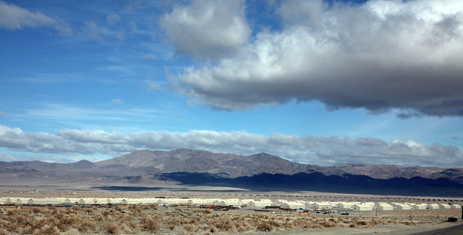 Near Walker Lake in the barren Nevada desert, drivers heading south to Las Vegas, Nevada (or the other way up to Reno) will pass a vast and mysterious cluster of military barracks and bunkers