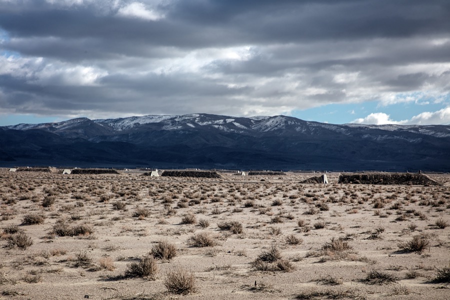 Near Walker Lake in the barren Nevada desert, drivers heading south to Las Vegas, Nevada (or the other way up to Reno) will pass a vast and mysterious cluster of military barracks and bunkers