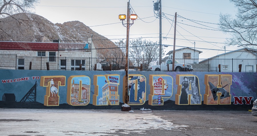 A postcard-style welcome sign in Tonopah, an old town in southwest Nevada that was once a boomtown known as the "Queen of the Silver Camps"
